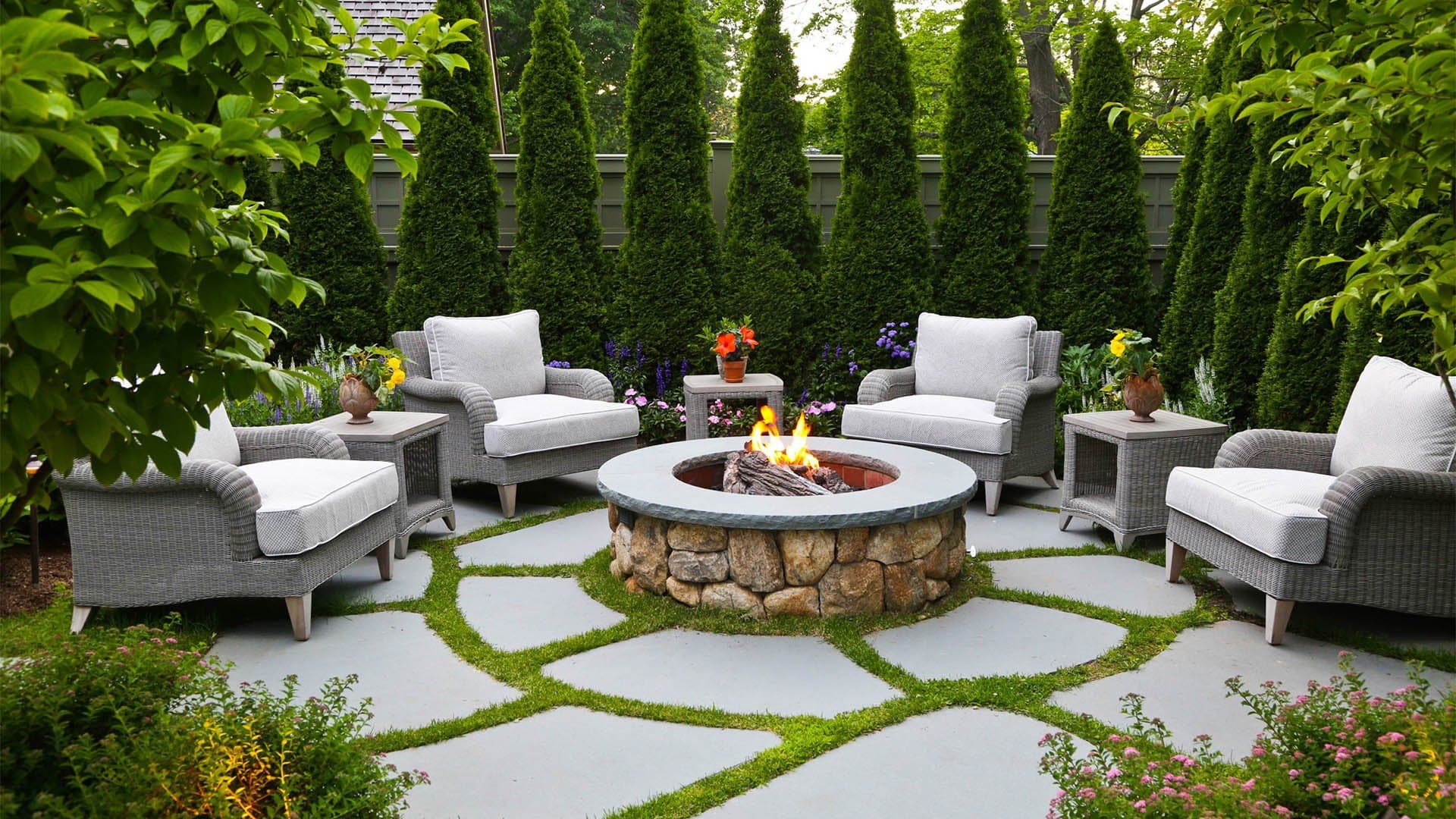 Beautiful patio with fire pit and landscaping